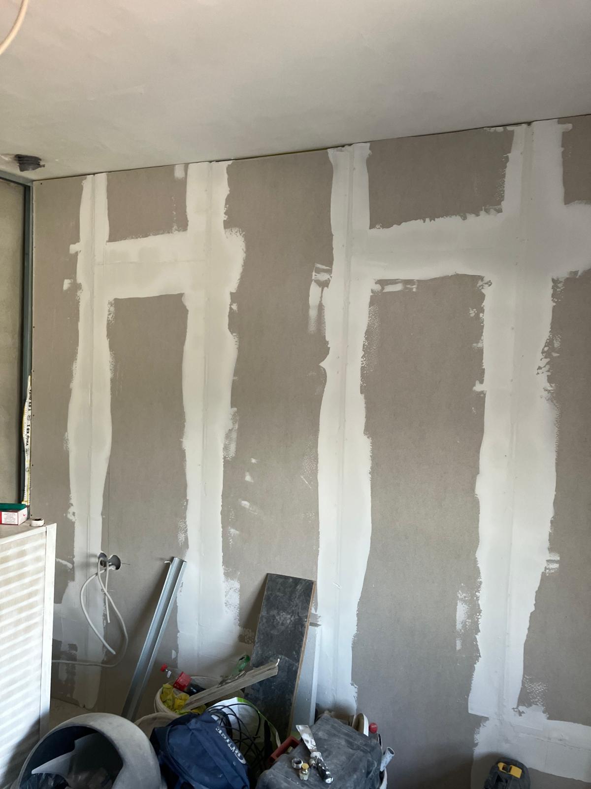 Ossature métallique et pose de plaques de plâtre Knauf